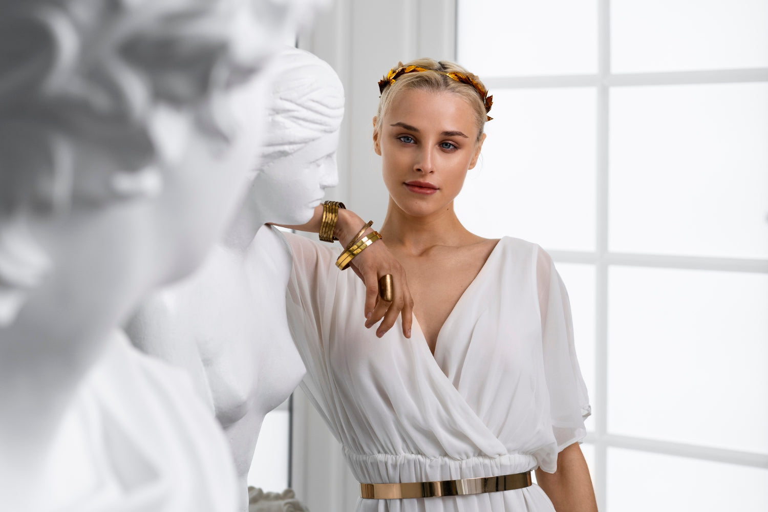 A woman dressed in Greek style with jewels