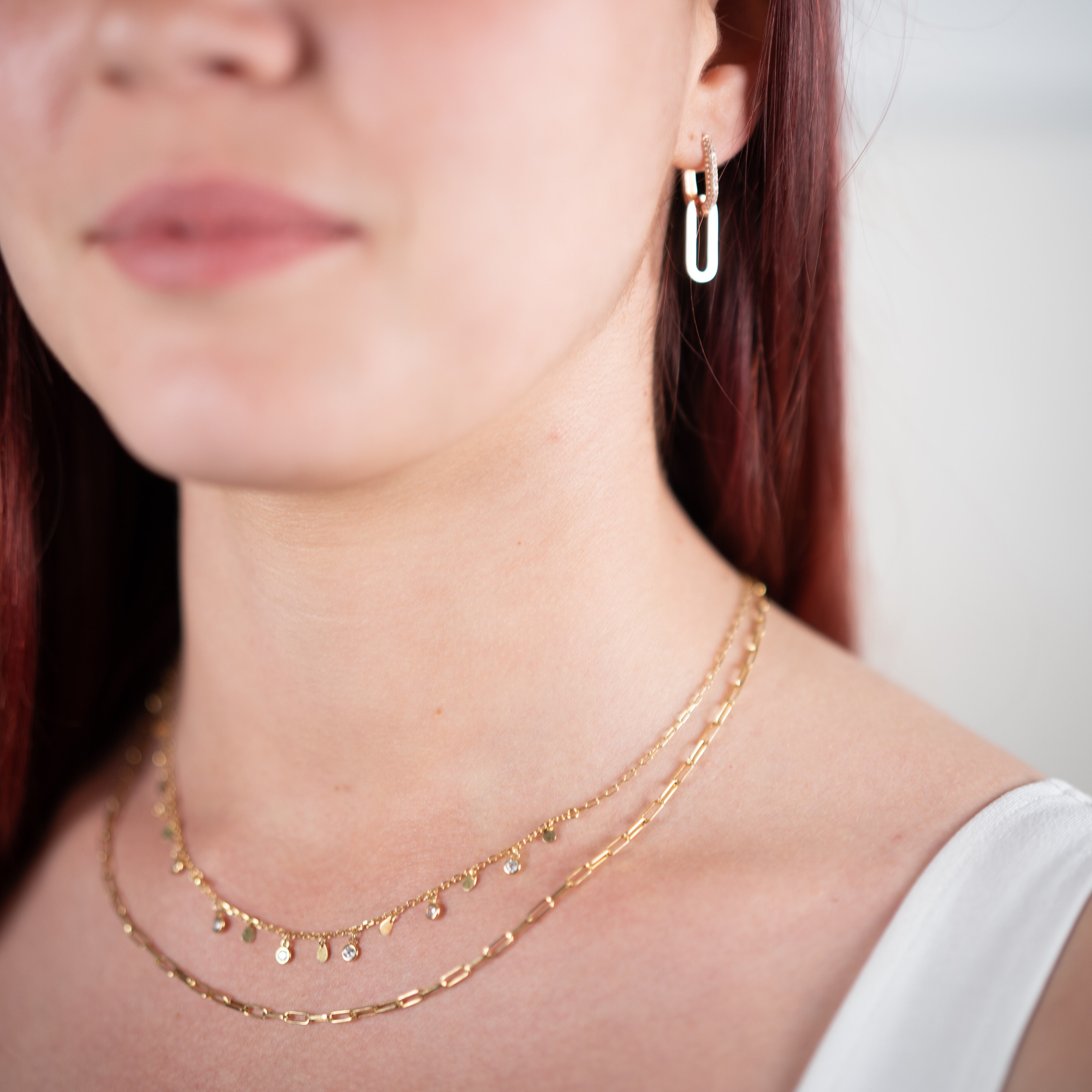 Orecchini pendenti regolabili in argento 925 placcato oro rosa e collana con catena di zirconi